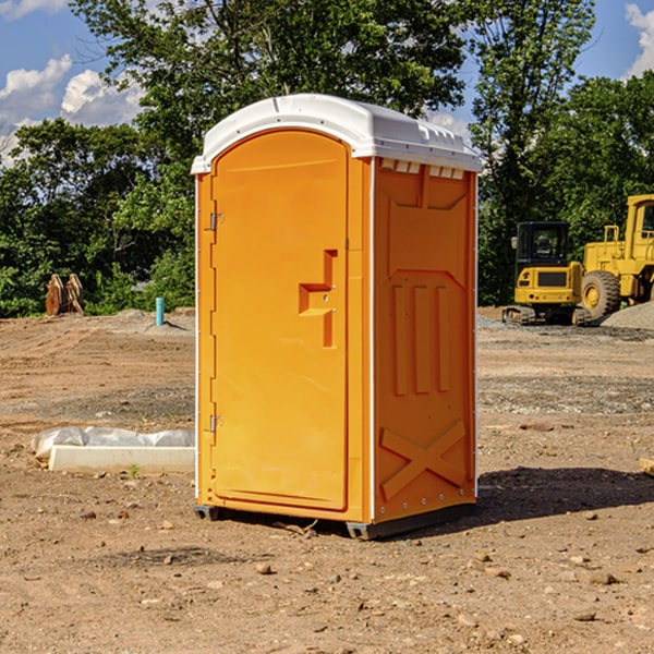 how often are the portable restrooms cleaned and serviced during a rental period in Versailles